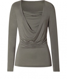 Raise the bar on contemporary classics with Steffen Schrauts elegant grey silk stretch top - Fitted, feminine cut with long sleeves - Flattering gather detail and draped faux cowl neck - Simple yet sophisticated, seamlessly transitions from work to weekend - Pair with a blazer or leather jacket and ankle cropped trousers, pencil skirts or skinny denim