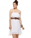 BCX contrasts a floaty dress with a frontier-chic belt, lending a rugged touch to a frock that's whimsicially femme!