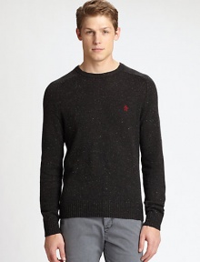 Classic crewneck sweater is impeccably knitted in a rich wool and cotton blend with contrasting donegal details, accented with an embroidered penguin detail at the chest.CrewneckRibbed knit collar, cuffs and hemWool/cotton/acrylicDry cleanImported