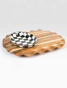 Beautifully handcrafted acacia wood tray is accented by a hand-painted checkerboard patterned bowl of ivory and onyx to create an admired centerpiece.Carved acacia wood will not absorb stains or odorsDurable steel bowl with stainless steel rimHand wash14 X 18Imported