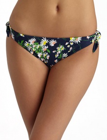 Sunny daisies grow throughout this stretch nylon style with side ties for added charm.Elastic waistband Side ties Fully lined 80% nylon/20% spandex Fully lined Hand wash Made in USA of imported fabricPlease note: Bikini top sold separately. 