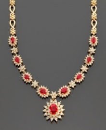 Experience timeless beauty with this lovely necklace featuring oval-cut ruby (4-3/8 ct. t.w.) and round-cut diamond (2-1/3 ct. t.w.) set in 14k gold, from Effy Collection. Approximate length: 18 inches. Approximate drop: 3/4 inch.