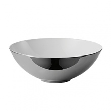 This classic design from Rosenthal now features a new series of graphics which follow the contours of each item and contrast between matte and glossy metallic surfaces, thus emphasizing its shape.