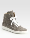 Sporty lace-up silhouette enlivened by a high-top canvas upper and distressed stitching. Rubber platform, 1 (25mm)Canvas upperLeather liningRubber solePadded insoleImported