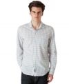 Pick up the check. This shirt from Calvin Klein Jeans will earn its keep on your style lineup in no time.