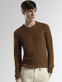 A smooth, streamlined pullover sweater knitted in a rich Italian wool.CrewneckRibbed knit collar, cuffs and hemWoolDry cleanMade in Italy