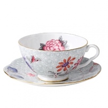 Step into a delightful garden party with Wedgwood's whimsical tea cup and saucer adds a flourish of color to your table with sophisticated and lively style.