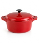 Set the scene for magical meals. From prep to presentation, this versatile dutch oven expertly braises and slow cooks, locking in moisture and flavor with a handy lid and heading effortlessly from oven to table with two contoured side handles. The striking enameled cast iron construction heats and cools quickly, while the porcelain interior is flavor- and odor-resistant for a lifetime of use. 1-year warranty.