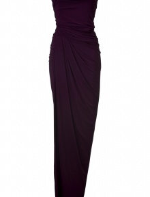 Make a dramatic statement in this ultra-sleek strapless gown from Donna Karan - Strapless, ruched fitted bodice, draped detailed waist with cascading draped overlay - Ruched back detail, floor length, fitted silhouette - Wear with metallic sandals and an embellished clutch