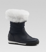 Fluffy fur cuffs cold weather boots with GG fabric shafts and curly shearling linings.Nylon upper Shearling lining Rubber sole Made in Italy