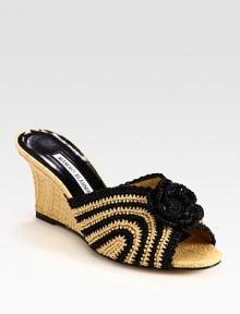 Intricately woven straw wedge with contrasting trim and a darling flower adornment. Straw wedge, 3 (75mm)Straw upperLeather lining and solePadded insoleMade in ItalyOUR FIT MODEL RECOMMENDS ordering one half size up as this style runs small. 