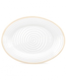 Distinctly ribbed Sophie Conran dinnerware sets your table with the charm of traditional hand-thrown pottery, but the durability of contemporary Portmeirion porcelain. Mix the banded Carnivale platter with solid biscuit pieces.