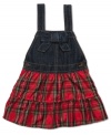 A bright plaid skirt on this Osh Kosh jumper will add a sweet look to her everyday style.