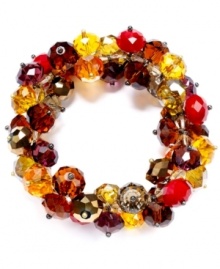 Clusters of fall colors for the season! Slip on c.A.K.e. by Ali Khan's stretchable bracelet, with autumn-inspired color glass beads. Crafted in gold tone mixed metal. Approximate diameter: 2 inches.