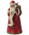 Ready to spread Christmas cheer, Santa is back at his list, checking it twice and getting ready to give toys to the nice. This folk-inspired figurine adds whimsical detailing, like a contrasting geometric design, to Santa's traditional getup.