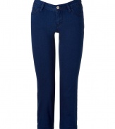 A flattering figure-hugging fit and an on-trend silhouette make these capri jeans from D&G Dolce & Gabbana a must-have for the new season - Five-pocket styling, logo detailed back pocket, cuffed hem - Wear with a boho-inspired blouse, a loose knit cardigan, and platform sandals