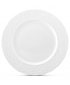 Set the tone with the white bone china of Devore dinnerware. A matte, organic texture lends chic distinction to an accent plate that's equally suited for fine dinner parties and every day of the week. From Donna Karan by Lenox.