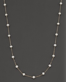 Beaded 14 Kt. white gold necklace with fresh water pearl stations.