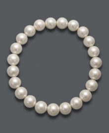 A simple layer adds a subtle hint of refinement. Charter Club stretch bracelet features a a sleek strand of white plastic pearls (8 mm). Approximate diameter: 2-1/4 inches.