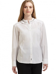 THE LOOKRuffled collar with chain detailButtonfrontButtoned cuffsLogo hardware at placket bottomShirttail hemTHE FITAbout 26 from shoulder to hemTHE MATERIAL76% cotton/21% nylon/3% elastaneCARE & ORIGINMachine washImported