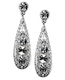 Slim and sophisticated. A unique narrow teardrop silhouette sets apart these dazzling drop earrings from Givenchy. Embellished with glittering glass accents and sparkling crystals, they're set in silver tone mixed metal. Approximate drop: 2 inches.