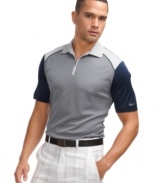 With a sporty, zip-neck polo shirt, this Greg Norman for Tasso Elba is performance styling at its finest.