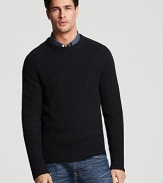 Crafted in a soft wool and cotton blend, this cozy crewneck is accented with leather elbow patches for that sexy professor look.