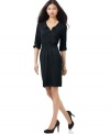 Spense beautifully blends the look of a shirtdress with the warmth of a sweaterdress in this must-have petite style.