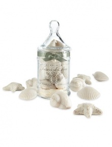 Nine assorted seashell-shaped soaps, fragrant with White Honeysuckle and Baby Jasmine. Presented in a classic glass apothecary jar and tied with a satin ribbon. 