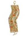 Take your jewel box on vacation with Lauren by Ralph Lauren's layered beaded bracelet. With tropical tones and textures, these strands dress up beach-bound favorites.