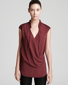 Soft ruffles and supple leather trim create an effortlessly elegant look on this chic Helmut Lang blouse, as perfect for daytime as it is for evening.