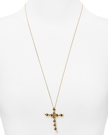 Cast in 14-karat gold and gunmetal plate, this House of Harlow 1960 necklace styles edgy glamor with its double sided cross pendant.