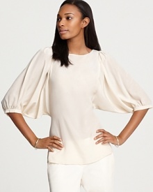 For a truly feminine office look, opt for this dolman-sleeved top from Pippa. The creamy silk style pairs effortlessly with all of your slim trousers and pencil skirts. Exclusively at Bloomingdale's.