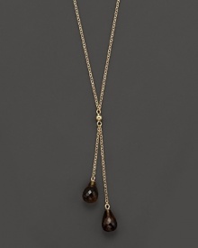 Twin smoky quartz briolettes sparkle from this 14K yellow gold lariat necklace.