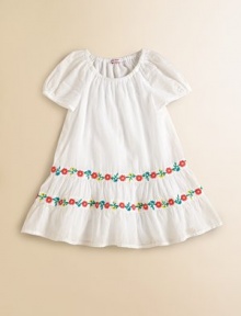 Tailored in airy cotton, this angelic frock is beautifully complemented with ruffled hem and two tiers of colorful, embroidered flowers.Elastic scoopneckShort puffed sleevesPullover styleRuffled hemCottonMachine washImported