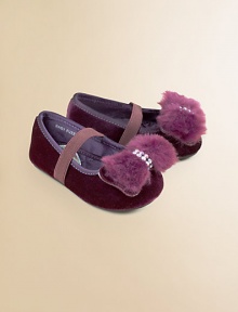 Baby's first Mary Janes are crafted in plush velvet with furry bow and elastic strap for easy on and off.Elastic strap across the vampVelvet upperSatin liningSynthetic suede solePadded insoleImported