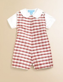 Crafted in luxurious silk, this dainty plaid shortall set dresses up baby in a snap.Overall CrewneckSleeveless with shoulder buttonsBottom snaps for easy on and offShirt Peter Pan collarShort sleevesFront buttonsSilkDry cleanImported Please note: Number of snaps may vary depending on size ordered. 