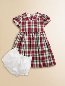 Adorned with a festive plaid print and matching tie, this gorgeous cotton frock with matching bloomers will make your little girl feel like a sugarplum fairy.Peter Pan collarShort puff sleevesBack buttonsWaistband with ribbon tieFull skirtFully linedCottonDry cleanImported Please note: Number of buttons may vary depending on size ordered. 