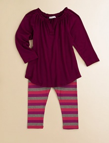 This charming pair features a playful tunic with a pretty pleated collar and stripey matching leggings. Tunic Split collarLong sleevesCurved hem Leggings Elasticized waistbandPull-on style96% rayon/4% spandexMachine washImported