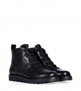 Add a kick of Downtown cool to your edgy daytime look with Marc by Marc Jacobs black leather lace-ups, a chic fusion of biker boots and sneakers - Rounded toe, stitched welt, flat laces, rubber lug sole - Wear with printed pants and moto jackets, or with opaque tights, chunky knits and micro-minis