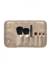 EXCLUSIVELY AT SAKS. Perfect for travel and on the go makeup applications and touch-ups. Includes 1 brush handle connector and 5 brush applicators. 