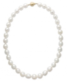 A simple style that exudes elegance. This sophisticated strand of cultured South Sea pearls (10-12 mm) strikes the perfect balance between day and evening. Features a brushed ball clasp in 14k gold. Approximate length: 18 inches.