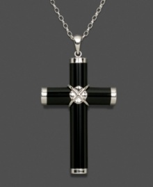 A dramatic interpretation of a traditional cross pendant. Tubular black onyx (7 mm) wrapped in sterling silver accents makes quite an impact. Necklace crafted in sterling silver. Approximate length: 18 inches. Approximate drop:1-1/4 inches.