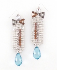 These crystal drop earrings by Jessica Simpson are as colorful as candy. Chandelier-style earrings feature a chain drop with crystal bows, teardrops, and accents. Crafted in silvertone mixed metal. Approximate drop: 2-1/2 inches.