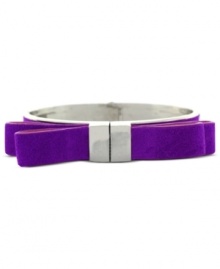 Purple reigns. This suede bow hinge bracelet from Vince Camuto is crafted from silver-tone mixed metal and offers a bit of a whimsical touch. Approximate diameter: 2-1/2 inches.