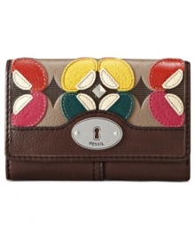 Get organized in the most mod way with this floral applique wallet that gives a nod to '70s flower power fashion. Ideally sized to slip inside a handbag, it boasts plenty of pockets and compartments for all the essentials. From Fossil.