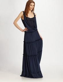 Soft, layered jersey in this season's must-have maxi silhouette, finished with tiered ruffles at the skirt.ScoopneckGathered shoulder strapsCrossover overlayWide waistbandTiered skirtAbout 64¼ from natural waistPolyesterDry cleanImported