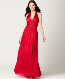 JS Boutique crafts a gown that's red-carpet worthy: With its ruched halter neckline, figure-flattering empire waist and long, floor-length silhouette, this gown is designed to steal the spotlight.