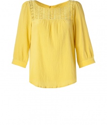 Bring sunshiny style to your day look with this retro-inspired top from Paul & Joe Sister - Round neck with knit panel, gathering at bust, three-quarter puff sleeves, back button placket, button detailed cuffs, relaxed silhouette - Style with high-waisted flared jeans, platform sandals, and a fringed shoulder bag