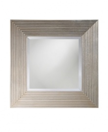 Step up guest room or entryway decor with the bright and bold Atlanta mirror from Howard Elliot. A dramatic wood frame gets extra attention thanks to a glistening silver-leaf finish with black accents.